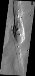This image from NASA's Mars Odyssey shows Alba Patera, a very large old volcano on the surface of Mars. While still impressive in height, it no longer towers over the surrounding plains.