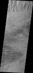 This image from NASA's Mars Odyssey shows where the base of the Olympus Mons escarpment meets the surrounding plains on Mars.