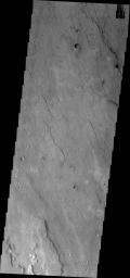 This image from NASA's Mars Odyssey shows a mesa in Simud Valles probably carved by running water.