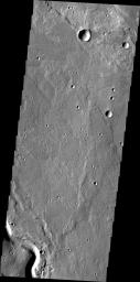This image from NASA's Mars Odyssey shows lava flows and a portion of Buvinda Vallis, a channel located at the base of Hecates Tholus.