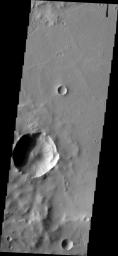 This image from NASA's Mars Odyssey shows numerous dark slope streaks in this unnamed crater in Terra Sabaea. Tikhonravov Crater is east of this crater.