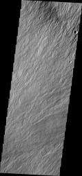 This image from NASA's Mars Odyssey shows numerous lava flows on the northern flank of Olympus Mons on Mars.