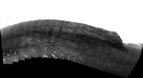 This image from NASA's Mars Exploration Rover Opportunity taken July, 2008 shows gull-shade lighting in late Martian afternoon of the layered cliff face of 'Cape Verde' promontory making up part of the rim of Victoria Crater in the Meridiani Planum.