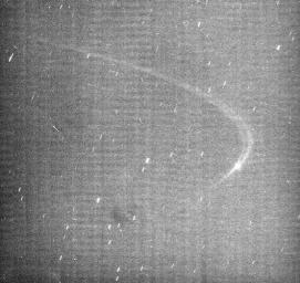 This image from NASA's Cassini spacecraft reveals the existence of a faint arc of material orbiting with Saturn's small moon Anthe.