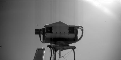 This image is a view of NASA's Phoenix Mars Lander's Surface Stereo Imager (SSI) as seen by the lander's Robotic Arm Camera. This image was taken on the afternoon of Sept. 22, 2008.