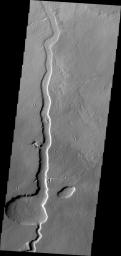 This image from NASA's Mars Odyssey shows a lava channel on Mars located in the Tharsis Volcanic region, east of Alba Patera and north of Mareotis Fossae.
