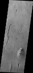 This image from NASA's Mars Odyssey shows a small volcano formed at one of the numerous volcanic vents located in the Tharsis region.