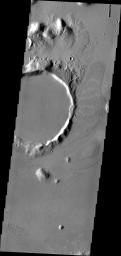 This image from NASA's Mars Odyssey shows the 'tongue' of platy lava located on the eastern side of the crater and spilling towards the north is the margin of an extensive lava field within Amazonis Planitia.