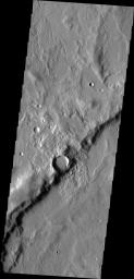 This image from NASA's Mars Odyssey shows a small channel system located on the outer rim of Sytinskaya Crater.