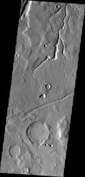 This image from NASA's Mars Odyssey shows a channel in the Tempe Fossae region, just west of Sytinskaya Crater.