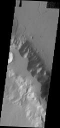 This image from NASA's Mars Odyssey shows several landslides located of the floor of Tiu Valles.