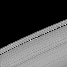 Waves in the edges of the Keeler gap in Saturn's A ring, created by the embedded moon Daphnis, show considerable complexity in this image taken as Saturn approached its August 2009 equinox. This image is from NASA's Cassini spacecraft.