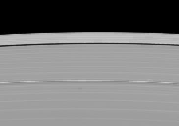 A scalloped look is created in the edges of the Keeler Gap in Saturn's outer A ring as the moon Daphnis orbits in the gap in this image taken by NASA's Cassini spacecraft on May 9, 2009.