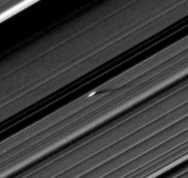 An unusually large propeller feature is detected just beyond the Encke Gap in this image from NASA's Cassini spacecraft of Saturn's outer A ring taken a couple days after the planet's August 2009 equinox.