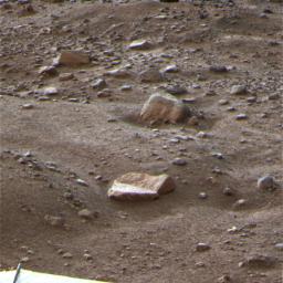 This is a false color image of the Martian terrain and rock called 'Winkies' taken by NASA's Phoenix Mars Lander Oct. 27, 2008. This frosty image is among the last taken by the lander before the mission's final communications on Nov. 2, 2008.