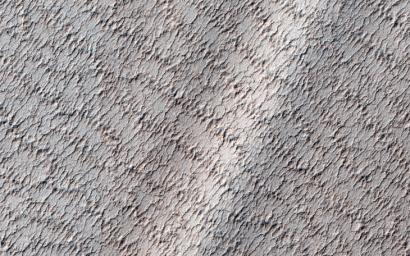 This image from NASA's Mars Reconnaissance Orbiter shows a lacy network of many fine channels associated with jets in the subliming carbon dioxide of the springtime.