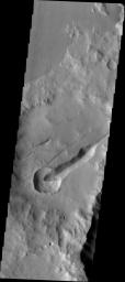 This image from NASA's Mars Odyssey shows part of the Sirenum Fossae on Mars. A smaller crater is cut by a large fracture of the fossae system while the ejecta of the crater covers a small fracture just northwest of the crater.
