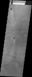 The sand dunes in this image are located on the floor of Herschel Crater on Mars as seen by NASA's Mars Odyssey spacecraft.
