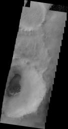 This 2001 Mars Odyssey image shows dark dunes located on the floor of this unnamed crater in Terra Sirenum on Mars.