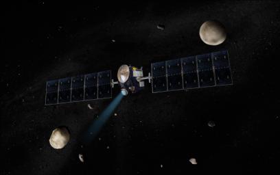 Artist's concept of the Dawn spacecraft with Vesta and Ceres.