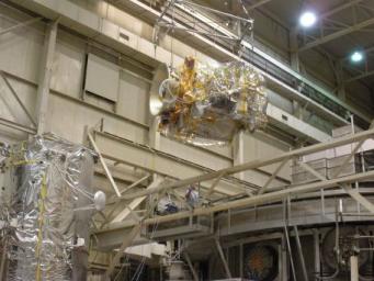 Loading the Lunar Reconnaissance Orbiter into the thermal vacuum chamber at Goddard Space Flight Center. Diviner is one of seven instruments aboard NASA's LRO Mission.