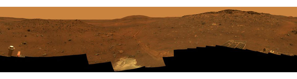 This full-circle,stereo view from the panoramic camera (Pancam) on NASA's Mars Exploration Rover Spirit shows the terrain surrounding the location called 'Troy,' where Spirit became embedded in soft soil during the spring of 2009.