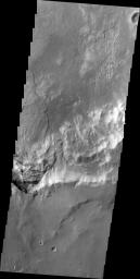Only a portion of a large landslide deposit is shown in this image taken by NASA's 2001 Mars Odyssey spacecraft. The landslide occurred on the rim of an unnamed crater southwest of Holden Crater.