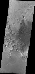 The dunes in this image are located on the floor of an unnamed crater in Tyrrhena Terra as seen by NASA's 2001 Mars Odyssey spacecraft.