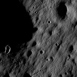 Full resolution detail from one of the first LROC NAC images. At this scale and lighting, impact craters dominate the landscape.