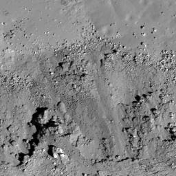 A subset of NAC Image M112162602L showing landslides (bottom) covering impact melt on the floor (top) of a fresh Copernican-age crater at the edge of Oceanus Procellarum and west of Balboa crater taken by NASA's Lunar Reconnaissance Orbiter.