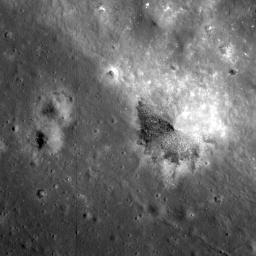 NASA's Lunar Reconnaissance Orbiter looks near the northeast edge of the unusually large melt pond adjacent to the lunar far side crater King.