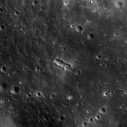 This image taken by NASA's Lunar Reconnaissance Orbiter shows a small secondary crater chain near the southwestern margin of Mare Orientale, within the Inner Rook Mountains. The ~125-meter-long chain lies within the Orientale multi-ring basin.