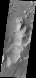 This image from NASA's 2001 Mars Odyssey shows a portion of Capri Chasma. Dunes are found on the floor of this chasma.