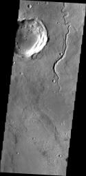 This image captured by NASA's 2001 Mars Odyssey shows a small channel located on the northern margin of Arabia Terra.
