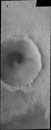 This image from NASA's Mars Odyssey is an unnamed crater in the far northern lowlands containing a sand sheet with dune forms on its floor. Many craters this close to the pole contain similar dune fields.