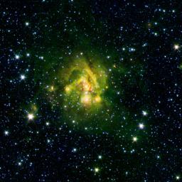 This image shows an outflow of gas from a new star as it jets from a space object dubbed IRAS 21078+5211. The reddish blob in its center, as picked up by NASA's Spitzer Space Telescope contrasts nicely with the clouds, colored green, that surround it.
