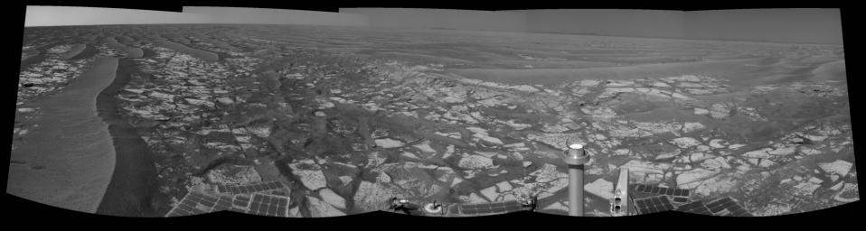 This panorama taken by NASA's Mars Exploration Rover Opportunity includes an outcrop informally called 'Cambridge Bay.' Opportunity examined this outcrop in August 2010.