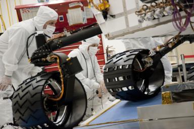 Test operators monitor how NASA's Mars rover Curiosity handles driving over a ramp during a test on Sept. 10, 2010, inside the Spacecraft Assembly Facility at NASA's Jet Propulsion Laboratory, Pasadena, Calif.