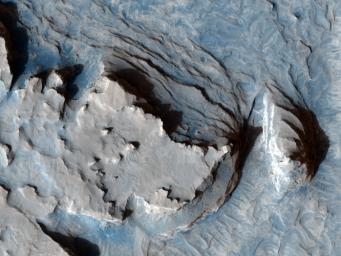 This image from NASA's Mars Reconnaissance Orbiter shows an arcuate ridge in Terra Meridiani.The ridge is most likely a former streambed, now exposed in inverted relief.