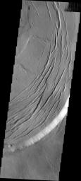 This image captured by NASA's Mars Odyssey shows one edge of the complex caldera at the summit of Olympus Mons.