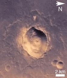 This wide-view picture of a heart-shaped feature in Arabia Terra on Mars was taken on May 23, 2010, by NASA's Mars Reconnaissance Orbiter. A small impact crater near the tip of the heart is responsible for the formation of the bright, heart-shaped feature