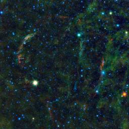 This large mosaic image from NASA's Wide-field Infrared Survey Explorer, features the wreckage of an exploded star, as well as other stars nearing the end of their lives.