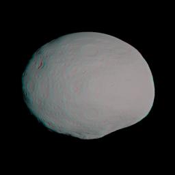 This anaglyph shows a 3-D model of the protoplanet Vesta, using scientists' best guess to date of what the surface of the protoplanet might look like. It was created as part of an exercise for NASA's Dawn mission. 3D glasses are necessary.