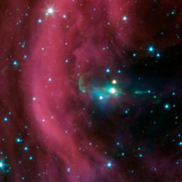 NASA's Spitzer Space Telescope took this image of a baby star sprouting two identical jets (green lines emanating from fuzzy star). The left jet was hidden behind a dark cloud, which Spitzer can see through.