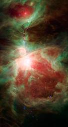This image from NASA's Spitzer Space Telescope shows what lies near the sword of the constellation Orion -- an active stellar nursery containing thousands of young stars and developing protostars. Many will turn out like our sun. 