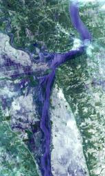 NASA's Terra spacecraft acquired this image on April 30, 2011, showing flooding along the Mississippi River at its junction with the Des Moines River near Keokuk, Iowa.