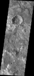 It is sometimes difficult to figure out the history of the surface of Mars as seen in visible wavelength images. This image from NASA's 2001 Mars Odyssey is located on the northern margin of Hellas Basin and hints at a layered surface.