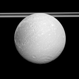 NASA's Cassini spacecraft examines the anti-Saturnian side of Dione and shows the cratered surface east of the moon's distinctive wispy terrain which consists of bright cliffs on the moon's trailing hemisphere.