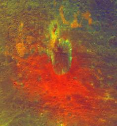 This false-color image obtained by NASA's Dawn spacecraft shows a crater on the giant asteroid Vesta. The reddish coloring below the crater points to material that was hurled from Vesta's interior during an impact or originated from the impactor itself.