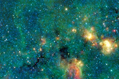 This infrared image from NASA's Wide-field Infrared Survey Explorer shows exceptionally cold, dense cloud cores seen in silhouette against the bright diffuse infrared glow of the plane of the Milky Way galaxy.